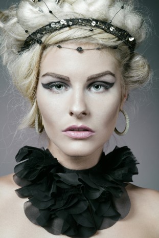 Beautiful fashion model with blond hair.